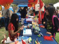 Kimberly Liu demonstrating dough figurine art